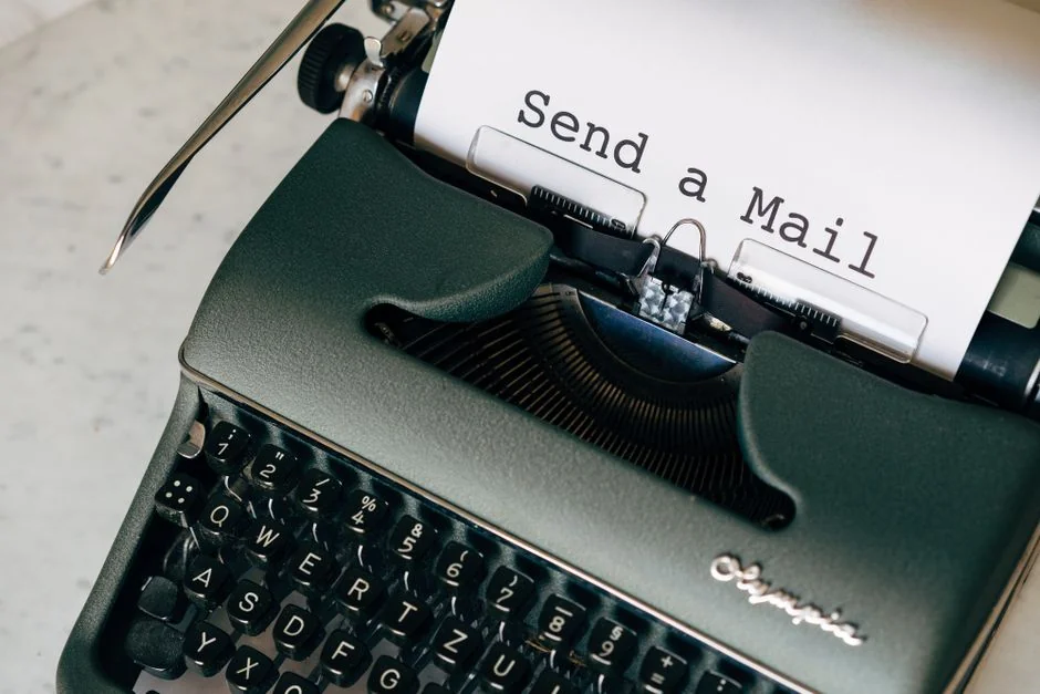 Close-up of a notebook page with Social Media Marketing handwritten on it.